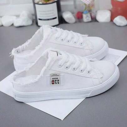 女士春季休闲帆布一脚蹬平底运动鞋白色运动鞋