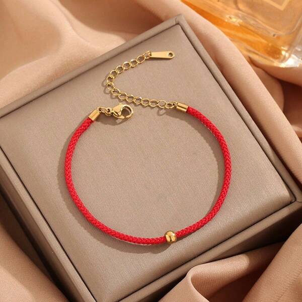 Pulsera de acero de titanio con una sola cuenta de oro, diseño minimalista de hilo rojo, amuleto de la suerte