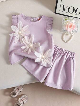 2件套少女珍珠花朵装饰上衣和纯色百搭短裤套装