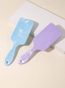 Todos aman este exquisito y de alta gama peine con cámara de aire y patrón de mármol imitación. Es el regalo perfecto para el Día de San Valentín. Tiene función de masaje del cabelludo y se puede usar tanto en el cabello seco como mojado. Puede desenredar el cabello, dejándolo suave y sin nudos. Además, es de tamaño compacto y fácil de llevar.