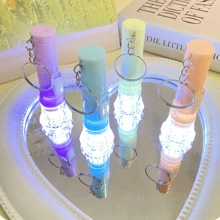 1 pieza Linterna LED con diseño de macaron de colores como juguete para fiestas de cumpleaños, llavero y antorcha