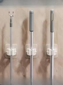 Gancho para trapeador sin rastro ni clavos, puede soportar fácilmente 10 kg, despídase del desorden de los trapeadores, mantenga su hogar limpio y ordenado. Gancho para trapeador de súper succión, firme y que no se cae, fácil de colgar en la pared, mantiene los suministros de limpieza del baño y la cocina en orden. Escoba telescópica multifuncional, adecuada para todo tipo de trapeadores y escobas, se puede instalar incluso en espacios estrechos, pequeño espacio, gran uso. Decoración del hogar y el baño