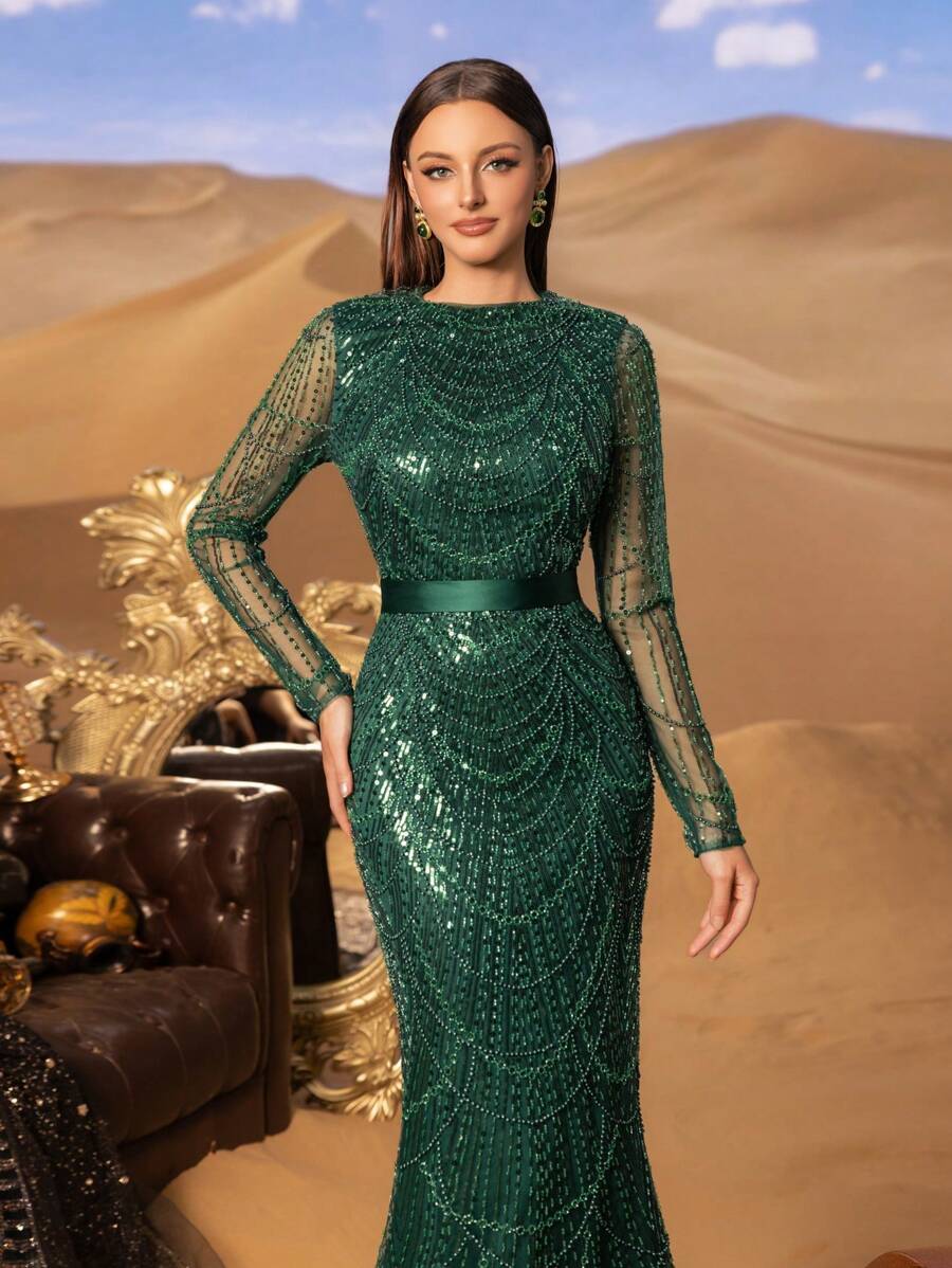 Faeriesty Đầm dạ hội dài tay đính cườm và sequin sang trọng – Kiểu dáng ôm sát với thắt lưng eo, tay áo voan mỏng và chân váy dài xòe kiểu đuôi cá, lý tưởng cho các đám cưới sang trọng, dạ tiệc trang trọng, tiệc tối lịch sự và các sự kiện theo phong cách người nổi tiếng. - Màu xanh lá cây đậm - Xem 1