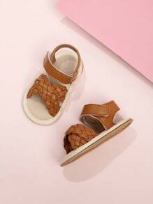 时尚交叉带 PU 婴儿凉鞋，透气软底防滑幼儿女童初学走路鞋