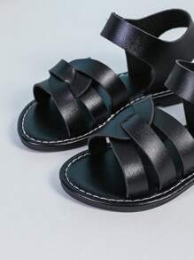1 paire de sandales plates à bout fermé en PU tissé noir pour filles, à la mode et mignonnes, adaptées aux garçons et aux filles de 3 à 15 ans, tenue décontractée au quotidien, nouvelle collection printemps/été 2025
