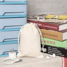 This Is A Fabric Storage Bag Made Of Imitation Linen Material. Multiple Sizes To Choose From. The Perfect Storage Bag For Small Items Such As Jewelry And Candy. Drawstring Style Design, Convenient To Close Storage Bag. The Material Is Tough And Not Easily Damaged Or Torn.