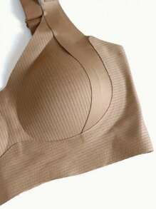 Set de 3 sujetadores deportivos sin costuras, transpirables y inalámbricos para mujeres - Cobertura total, antideslizante, con elevación y soporte, ajuste cómodo con detalles acanalados, mezcla de nailon y elastano, lavar a mano - unicolor elegantes