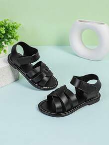 1 paire de sandales plates à bout fermé en PU tissé noir pour filles, à la mode et mignonnes, adaptées aux garçons et aux filles de 3 à 15 ans, tenue décontractée au quotidien, nouvelle collection printemps/été 2025