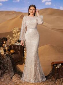 Faeriesty 高级魅力优雅长袖亮片鱼尾礼服，专为女性打造——精致的水晶串珠刺绣，闪耀夺目的全身细节，修身喇叭裙摆，适合红毯活动、奢华婚礼、正式晚宴和时装秀等场合。