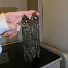 1 paire de boucles d'oreilles à pompons strass de luxe haute de gamme à la mode pour la boîte de nuit