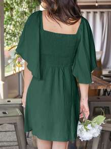 Robe décontractée pour femmes à col en V profond, nouée devant, à manches courtes