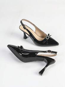 女士镜面漆尖头露背蝴蝶结心形细节细高跟鞋，黑色