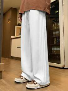 Pantalones rectos sueltos informales para hombres, de material semi-grueso, de moda y versátiles