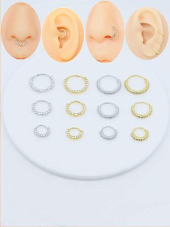 1 件镶有水钻的鼻环，配锆石耳骨环