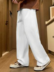 Pantalones rectos sueltos informales para hombres, de material semi-grueso, de moda y versátiles