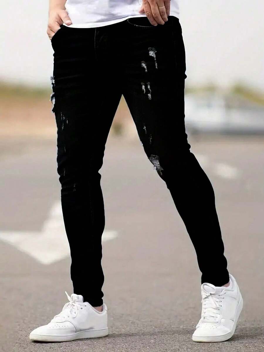 Jeans casuales de caballero de unicolor con rotos, de corte slim