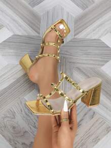 女士金色方头粗跟铆钉一脚蹬凉鞋，时尚、性感、舒适，适合日常穿着