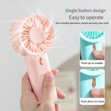 1 pieza Mini ventilador de mano para volver a la escuela con 2 pilas AA (pilas no incluidas)