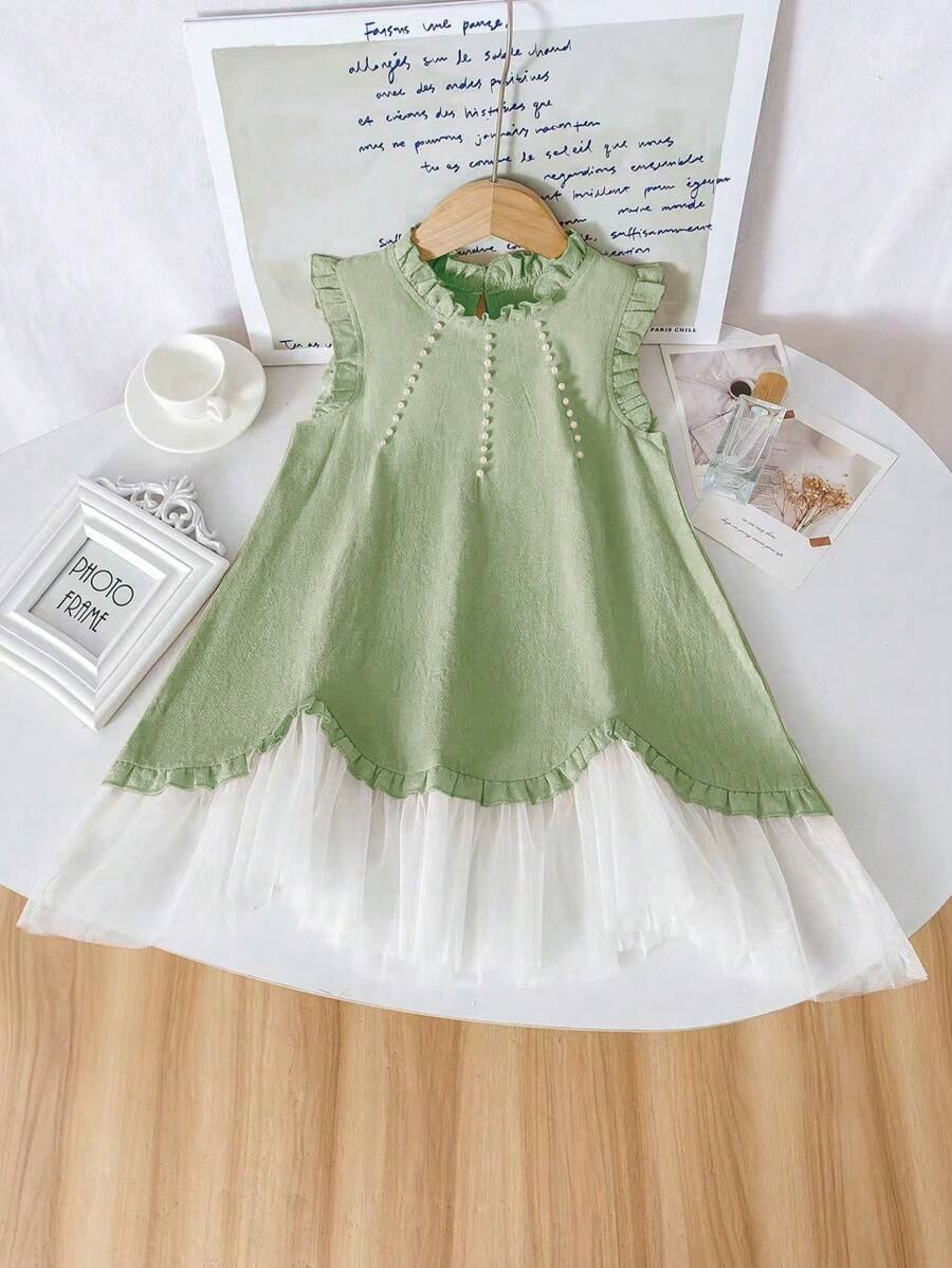 这款女童田园风象牙白网纱荷叶边连衣裙，设计清新优雅，是女孩参加派对、表演和拍照的必备单品，适合4-7岁女孩，春夏穿着。网纱易燃，请远离火源。 - 綠色 - 查看 1