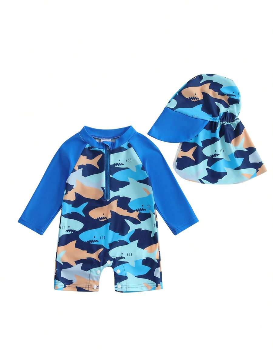 Bañador con protección solar para niños y niñas pequeños(as) con estampado de margaritas/tiburones, manga larga y gorra de natación - Azul - Ver 1