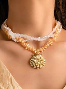 قلادة عقدة نجمة البحر ذات الطبقات للنساء المرتبطة بالشاطئ والبحر، مصنوعة يدويًا من الأصداف