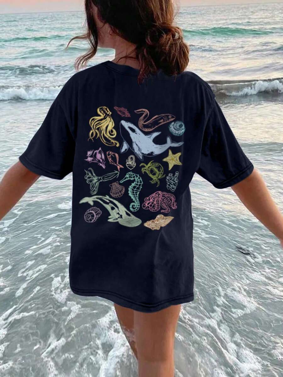 Ein legeres bedrucktes Rundhals-Pullover Kurzarm T-Shirt für Mädchen und Kinder - ein süßes Delfin-Motiv, lustiges und buntes T-Shirt, das die Fantasie jedes Kindes anregt! Kinderkleidung Mädchen Grafik-Shirts Sommer Tops Kleidung für Tween Mädchen