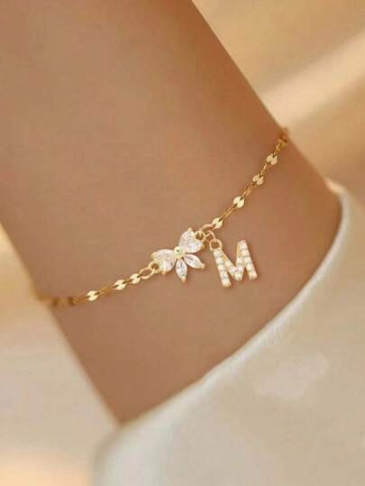 1件简约时尚水晶蝴蝶结镶嵌锆石字母不锈钢镀金唇链手链，女士情人节礼物