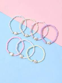 Set de 7 pulseras decorativas para niñas con dijes de corazón, estrella y mariposa de cuentas de colores, para uso diario