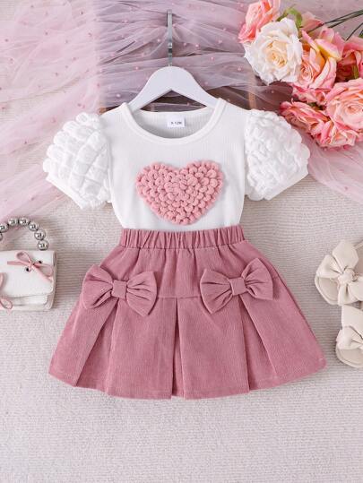 Set de 2 piezas con blusa de manga corta blanca elegante con corazón y falda rosa para bebé niña, liviano para el verano