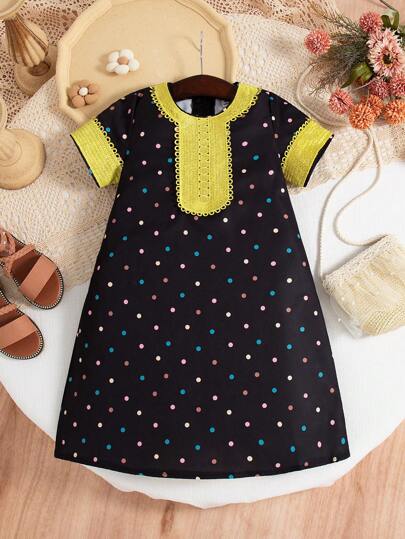 年轻女孩彩色圆点黑色度假连衣裙