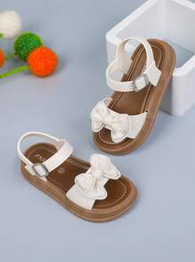 1 双纯色女童平底凉鞋，带蝴蝶结和钩环设计，适合夏季