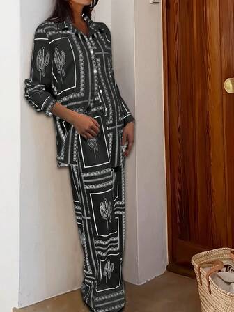 新款时尚女式休闲优雅随机印花纽扣装饰长袖上衣和长裤两件套西装套装，适合婚礼