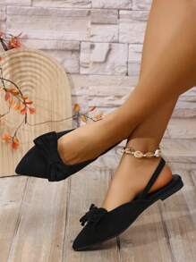 Sandalias planas tipo slip-on con puntera cerrada, decoración de lazo y punta afilada,