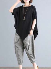 不对称下摆圆领 T 恤 - 舒适短袖 T 恤适合春夏季，宽松版型，柔软面料，透气，轻盈，温暖天气下女性的休闲穿着