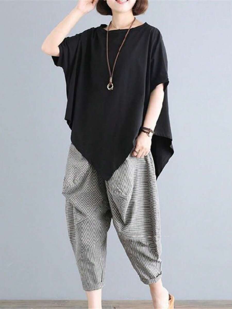 不对称下摆圆领 T 恤 - 舒适短袖 T 恤适合春夏季，宽松版型，柔软面料，透气，轻盈，温暖天气下女性的休闲穿着