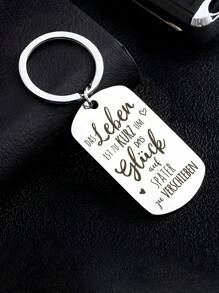 1 pieza Nueva Placa conmemorativa en acero inoxidable grabada con el lema inspirador alemán "La vida es corta, no retrases la felicidad", colgante de llavero, regalo para colegas y amigos