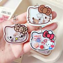Sanrio 1 pieza Llavero con gatito de dibujos animados que se mueve, dije adorable de gato para mochilas y bolsos, regalo perfecto para cumpleaños, Pascua, accesorios adorables (estilo aleatorio)