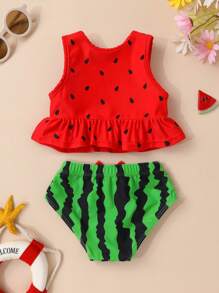Conjunto de tankini y shorts para niña con estampado de sandía, volantes y lazo decorativo, ideal para el verano