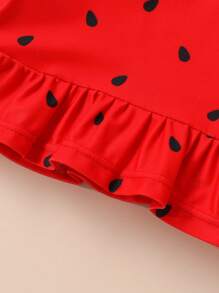 Conjunto de tankini y shorts para niña con estampado de sandía, volantes y lazo decorativo, ideal para el verano