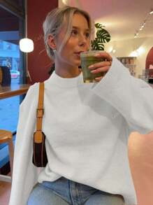 Women's Minimalist Solid Color Round Neck Long Sleeve Knit Pullover Sweater