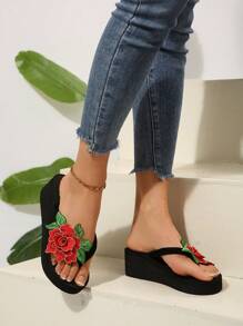 女士花卉装饰人字凉鞋，中跟厚底，舒适设计，适合度假和海滩 - 黑色 - 查看 2