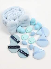 一套18件化妆工具，包括3个三角粉扑，3个迷你化妆蛋，3个粉扑气垫，3个迷你拇指粉扑，3个葫芦化妆蛋，1个发带和2个腕带。带有柔软蝴蝶结洗脸头带的全新高吸引力发饰组合。