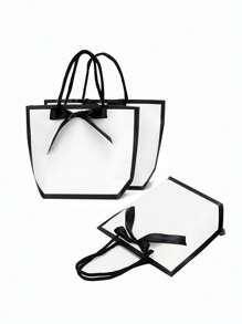 10 pièces/5 pièces/1 pièce Sacs fourre-tout cadeaux avec décoration de nœud noir et blanc simple. Grands sacs de transport en papier blanc. Sacs de shopping de couleur unie. Fournitures pour petites entreprises. Fête des pères, Fête des mères, rentrée scolaire, mariage d'été, anniversaire. Sacs cadeaux de qualité supérieure. Les meilleurs et les moins chers. Faveurs de mariage. Les meilleurs sacs cadeaux pour la famille et les amis
