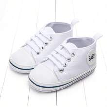 Zapatos blancos para bebé, diseño simple de cordones para niños y niñas, moda suave, suela antideslizante, zapatos planos para recién nacidos