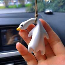 1 Stück kreatives, farbwechselndes Ente Auto Anhänger Tasche Zubehör mit UV Farbwechsel Bratenente Flug Dekoration süßer Schlüsselanhänger Geburtstagsgeschenk