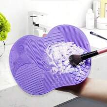 1 tampon de frottage en silicone avec ventouse, tampon de frottage en silicone, outil de beauté, tampon de frottage, tampon de nettoyage de pinceau de maquillage, brosse de beauté de nettoyage quotidien, pinceau de maquillage, tampon de frottage, bol de lavage pliant portable en silicone (style et couleur aléatoires)