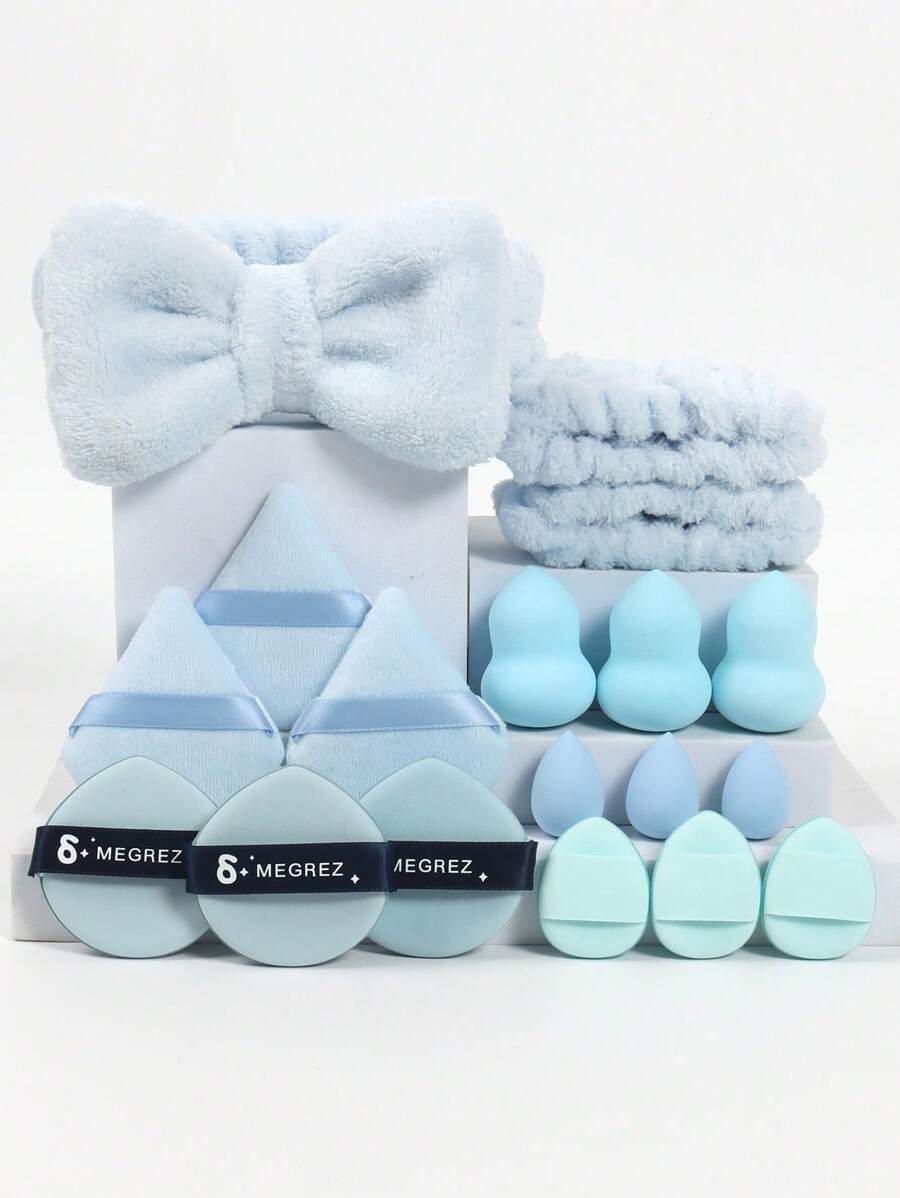 一套18件化妆工具，包括3个三角粉扑，3个迷你化妆蛋，3个粉扑气垫，3个迷你拇指粉扑，3个葫芦化妆蛋，1个发带和2个腕带。带有柔软蝴蝶结洗脸头带的全新高吸引力发饰组合。