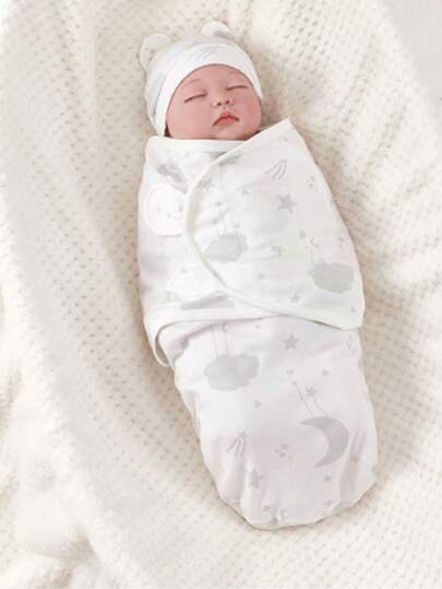 1 件新生儿襁褓毯 + 帽子套装，带星星和月亮图案