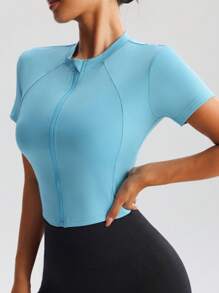 Chaqueta deportiva de manga corta ajustada y transpirable para mujer, con cuello alto y cremallera, apropiada para yoga, correr y gimnasio
