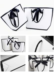 10 pièces/5 pièces/1 pièce Sacs fourre-tout cadeaux avec décoration de nœud noir et blanc simple. Grands sacs de transport en papier blanc. Sacs de shopping de couleur unie. Fournitures pour petites entreprises. Fête des pères, Fête des mères, rentrée scolaire, mariage d'été, anniversaire. Sacs cadeaux de qualité supérieure. Les meilleurs et les moins chers. Faveurs de mariage. Les meilleurs sacs cadeaux pour la famille et les amis